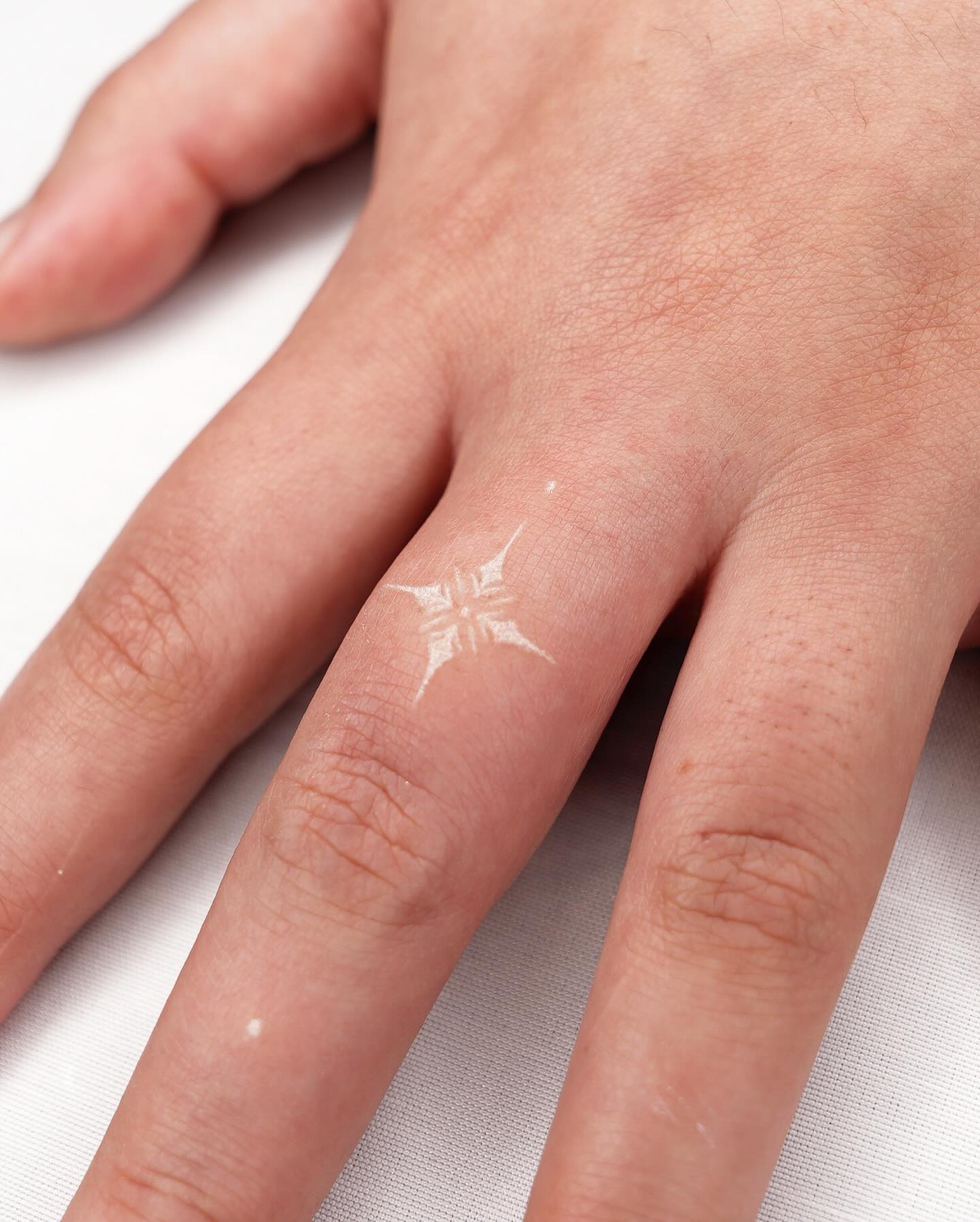 white tattoos